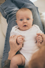 Image showing Mother holding sweet baby boy