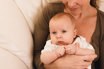 Image showing Mother holding sweet baby boy