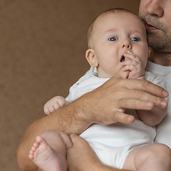 Image showing Father Holding Newborn Baby Son