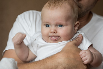 Image showing Father Holding Newborn Baby Son