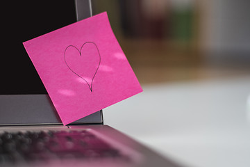 Image showing Laptop keyboard with heart note