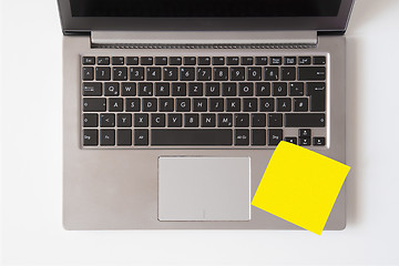 Image showing Laptop with blank note