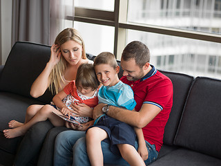 Image showing young cuple spending time with kids