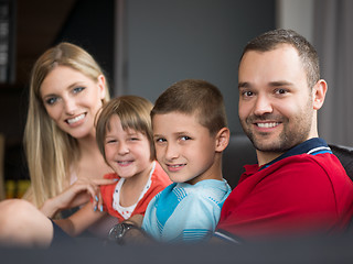 Image showing young cuple spending time with kids