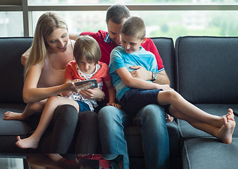 Image showing young cuple spending time with kids