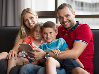 Image showing young cuple spending time with kids