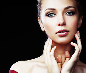 Image showing beautiful rich blond woman in elegant dress on black background