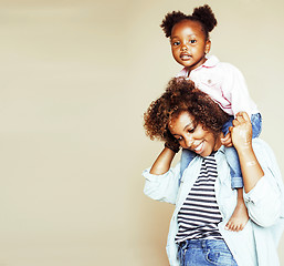 Image showing adorable sweet young afro-american mother with cute little daugh