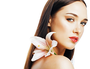 Image showing young attractive lady close up with hands on face isolated flowe