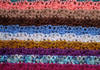 Image showing Background of crocheted stitches in multi-coloured stripes