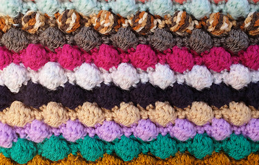 Image showing Horizontal multi-coloured stripes of bobble crochet stitches bac
