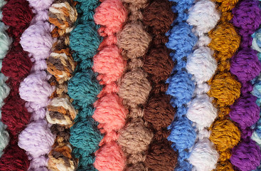 Image showing Vertical bobble crochet stitches, multi-coloured wool striped ba