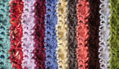 Image showing Crocheted yarn stitches in mixed colour stripes background