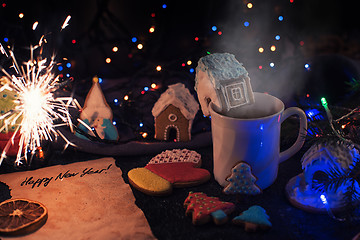 Image showing Christmas cookies and cup of tea