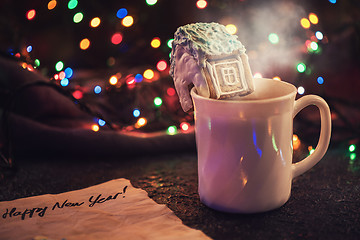 Image showing Christmas cookies and cup of tea