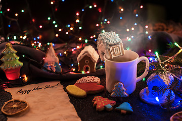 Image showing Christmas cookies and cup of tea