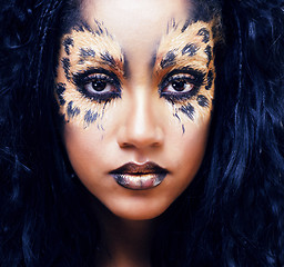 Image showing beauty afro girl with cat make up, creative leopard print closeup