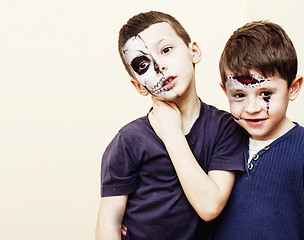 Image showing zombie apocalypse real kids concept. Birthday party celebration facepaint on children dead bride, scar face, zombie skeleton together close up makeup emotional posing.