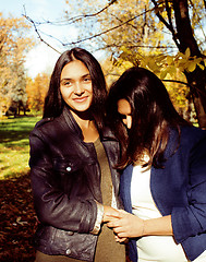 Image showing mature real mother with daughter outside autumn fall in park