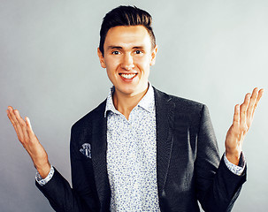 Image showing young pretty businessman posing emotional on white background, lifestyle people concept
