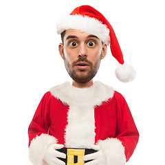 Image showing surprised man in santa claus costume over white