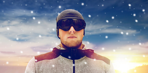 Image showing sports man with ski goggles in winter outdoors