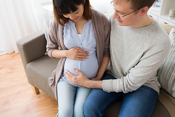 Image showing close up of man and pregnant woman