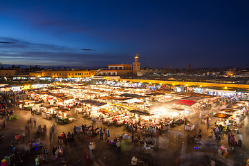 Image showing Jamaa el Fna market square at dusk, Marrakesh, Morocco, north Africa.