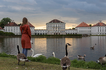 Image showing Dramatic post storm sunset scenery of Nymphenburg palace in Munich Germany.