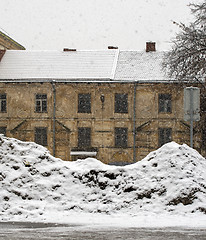 Image showing Dirty snow heap in the city