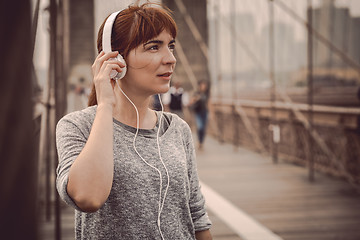 Image showing Woman resting after exercise