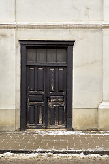 Image showing Black wooden doors of old historical house