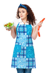 Image showing Young housewife on white