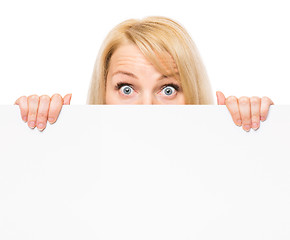 Image showing Woman with blank signboard