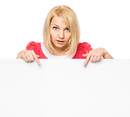 Image showing Woman with blank signboard