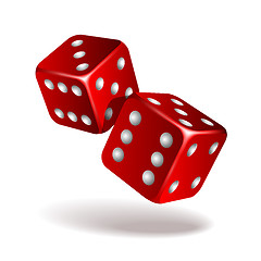 Image showing Two red falling dice isolated on white.