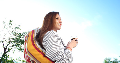 Image showing drinking coffee on terrace of villa in the morning