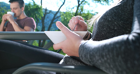 Image showing Happy Couple Drinking Coffee and eating breakfast on terrace of 