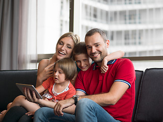 Image showing young cuple spending time with kids