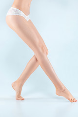 Image showing Perfect female legs in underwear.
