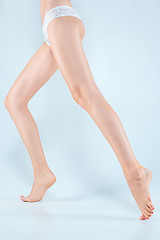 Image showing Perfect female legs in underwear.