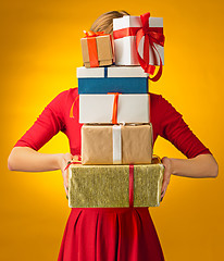 Image showing The closeup picture of woman\'s hands with gift box