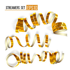 Image showing Set of gold curling streamers on white