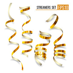 Image showing Set of gold curling streamers on white