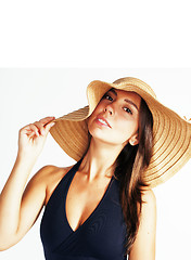 Image showing young pretty brunette woman wearing summer hat and swimsuit isol