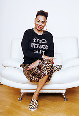 Image showing pretty stylish african american big mama woman well dressed. swag relax at home, leopard print on clothers. fashion look