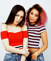 Image showing best friends teenage girls together having fun, posing emotional on white background, besties happy smiling, lifestyle people concept, blond and brunette multi nations 