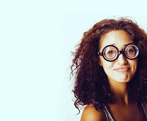 Image showing teenage bookworm concept, cute young woman in glasses, lifestyle people concept