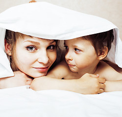 Image showing young blond woman with little boy in bed, mother and son, happy familyyoung blond woman with little boy in bed, mother and son, happy family 