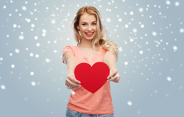 Image showing happy woman or teen girl with red heart shape